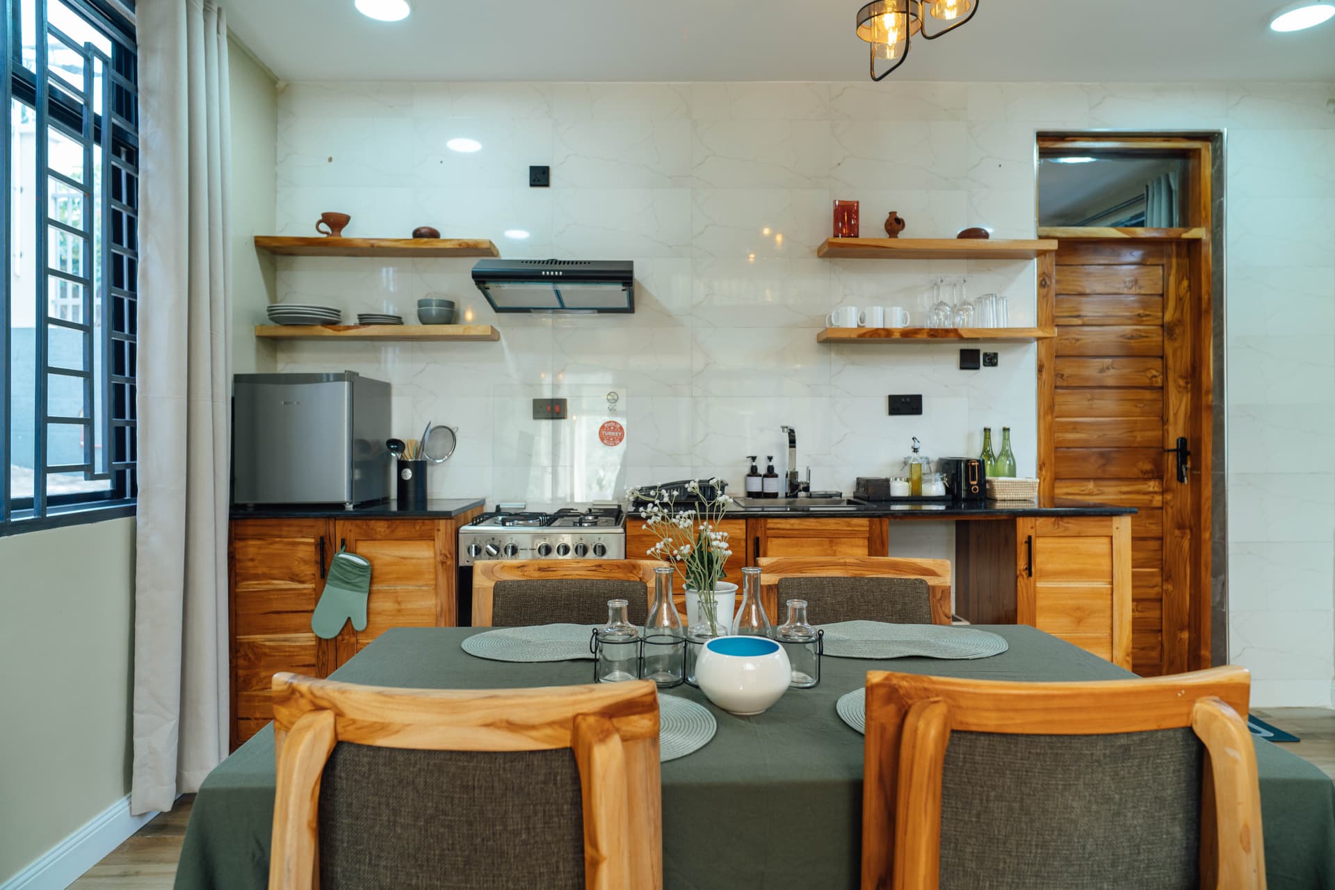 Fully equipped kitchen ready for extended stays at Starico Residence